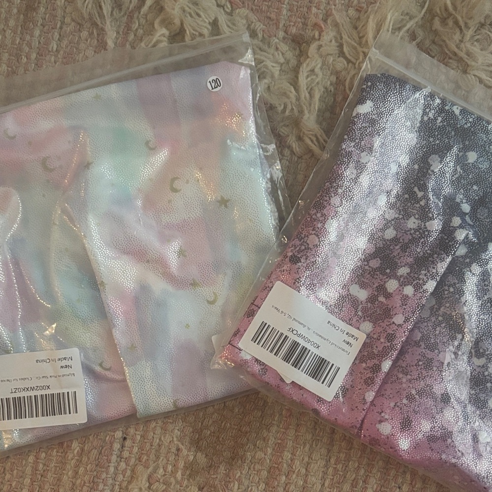 Amazon Kids One Pieces - Pastel Rainbow two of them leotards
G